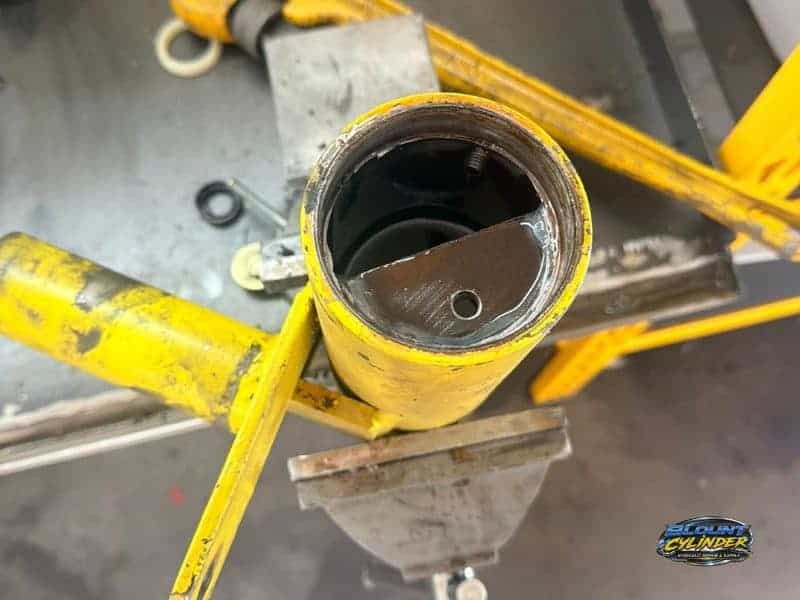 Industries yellow hydraulic cylinder housing