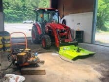 a red tractor inside our workshop